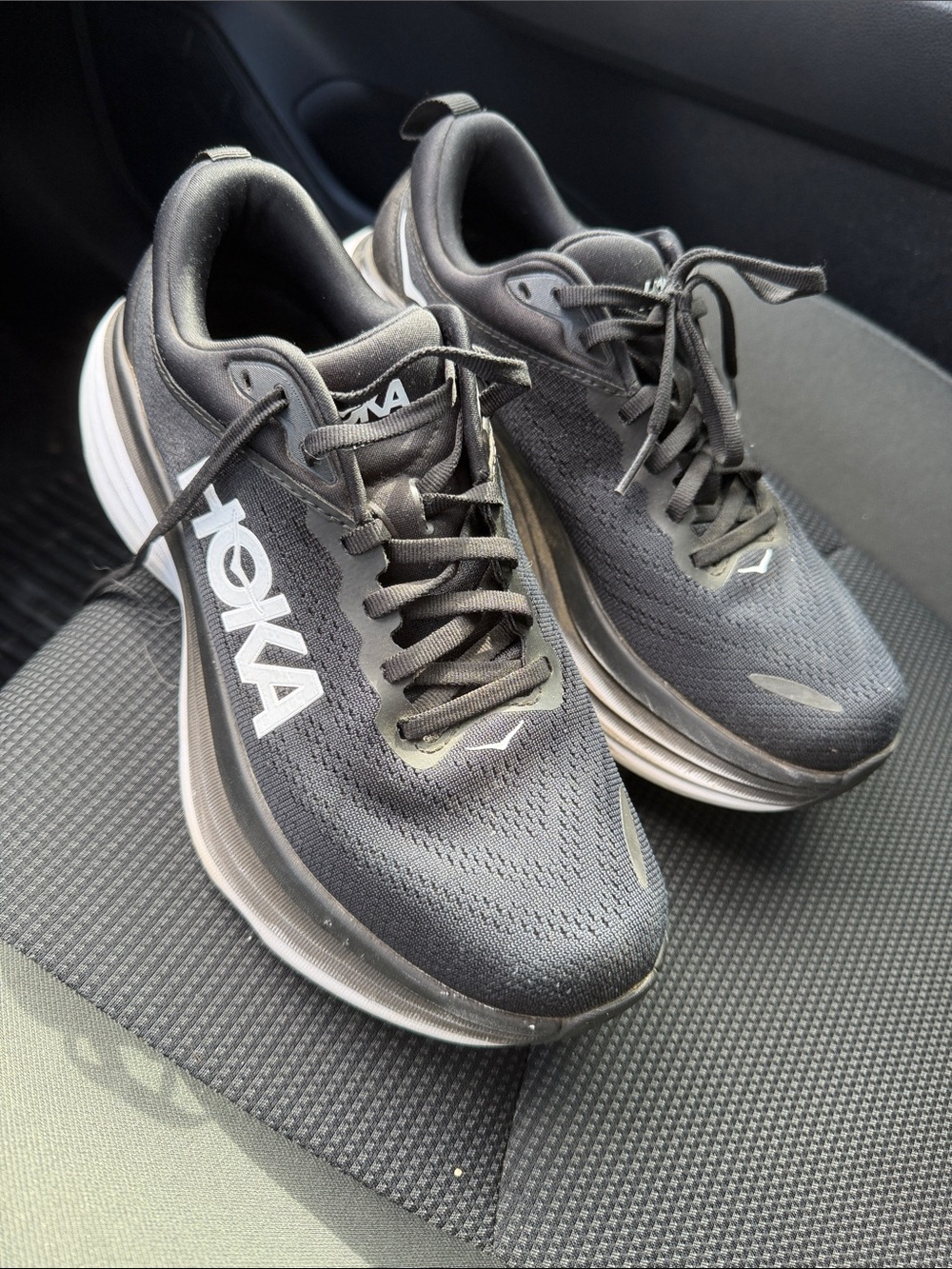 Hoka women’s Black Athletic Running Shoes with White Logo